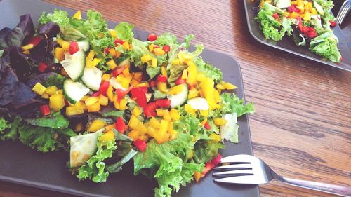 High angle view of chopped fruits on table