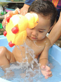 Portrait of cute girl in water