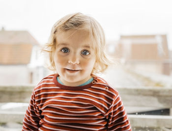 Portrait of smiling cute baby girl