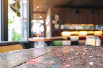 Close-up of empty seats on table in restaurant