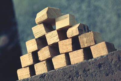 Close-up of stack of stacked against the sky