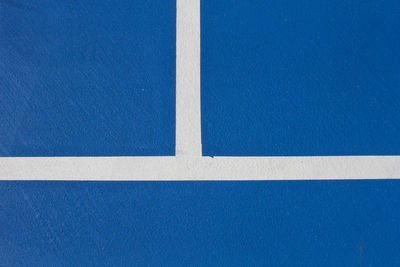 Blue training tennis court with white line , top view