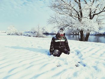 Man on snow covered field