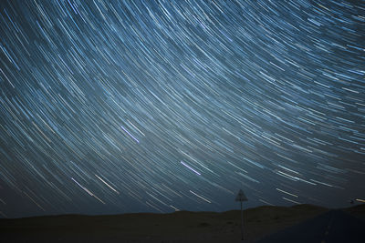 Scenic view of star field against sky at night