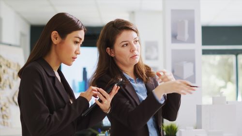 Businesswoman using mobile phone