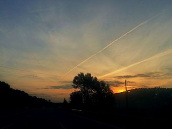 Scenic view of road at sunset