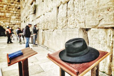 Hat on lectern against wailing wall