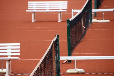 High angle view of empty seats on tennis court 