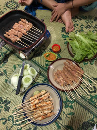 High angle view of food on barbecue grill