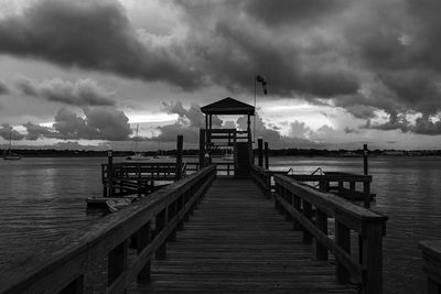 Pier over sea against sky