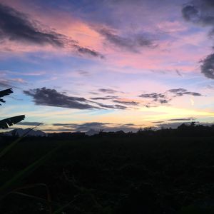 Scenic view of landscape against sky during sunset