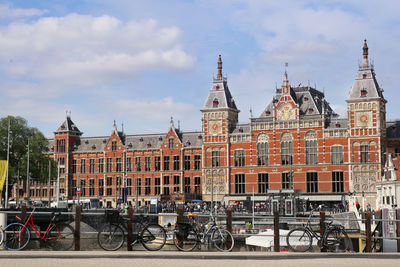 View of buildings against cloudy sky