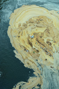 High angle view of rocks on beach