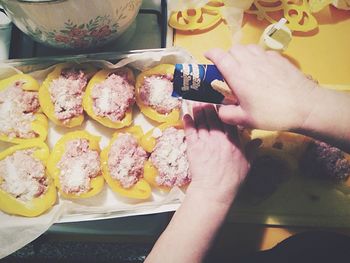 Cropped image of person eating food