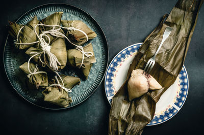 Zongzi is a delicacy that chinese people must eat during the dragon boat festival 