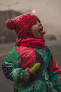 Full length of woman in hat during winter