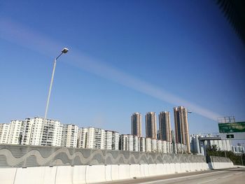 Low angle view of building against blue sky