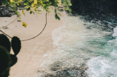 High angle view of man standing on beach