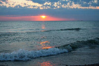 Scenic view of sea against sky during sunset