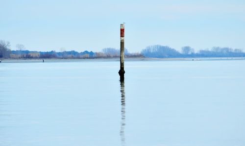 Scenic view of frozen lake against sky