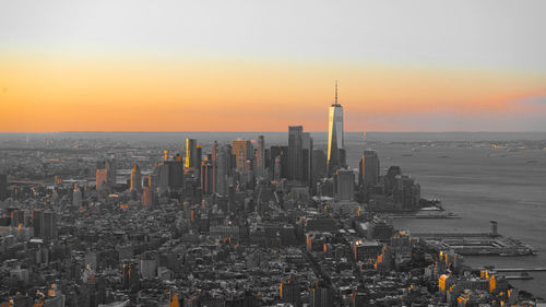 High angle view of city at sunset