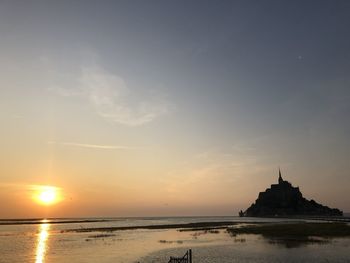 Scenic view of sea against sky during sunset