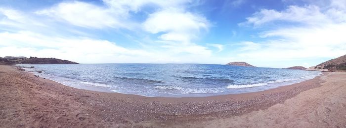 Panoramic view of beach against sky