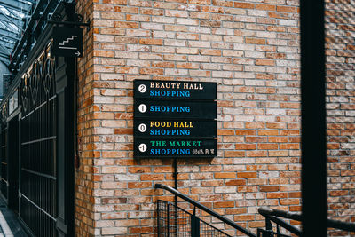 Shopping sign, pointer, text in big shopping center, modern mall