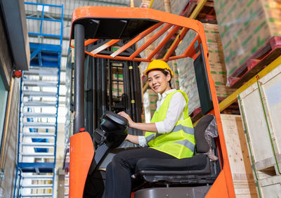 Portrait of smiling man sitting in office