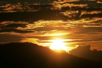 Sun shining through clouds