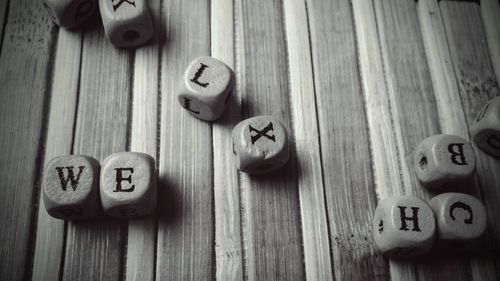 High angle view of alphabets on wooden cubes at table