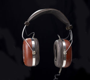 Close-up of lighting equipment against black background