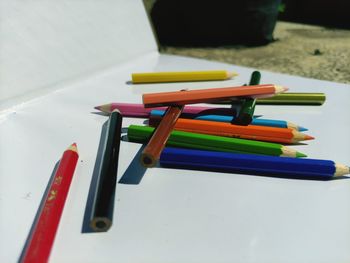 High angle view of multi colored pencils on table