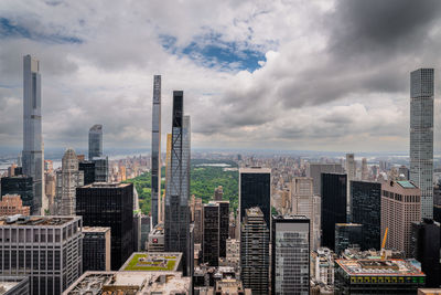 Central park against cloudy sky