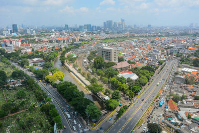 High angle view of street amidst buildings in city