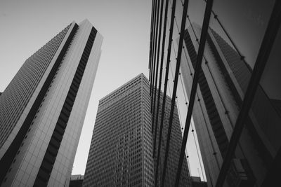 Low angle view of modern buildings against clear sky