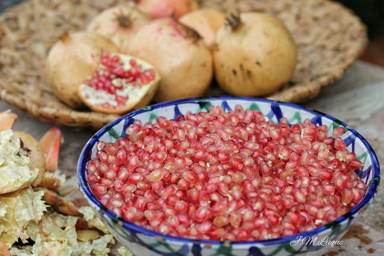 food, food and drink, freshness, healthy eating, wellbeing, still life, fruit, close-up, indoors, no people, large group of objects, container, selective focus, bowl, high angle view, table, basket, red, ready-to-eat, market, chopped, snack, temptation