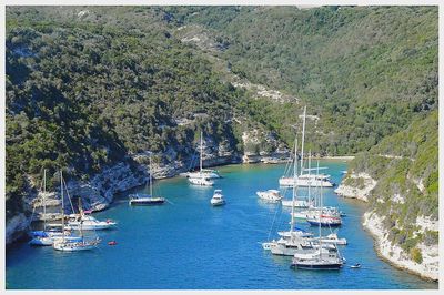 High angle view of boats moored in sea