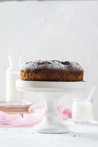 Close-up of cake slice in plate on table