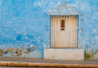 Window on blue wall, trinidad