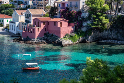Scenic view of sea and buildings