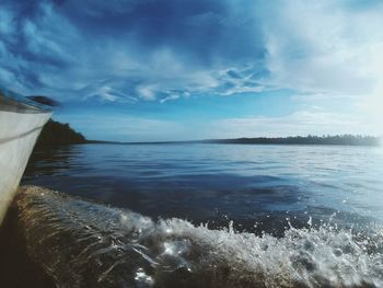 Scenic view of sea against cloudy sky