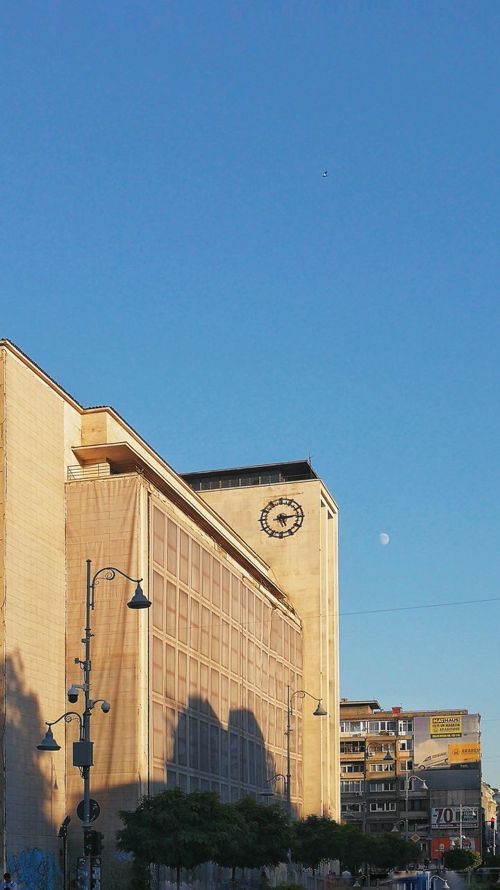 EXTERIOR OF BUILDING AGAINST BLUE SKY