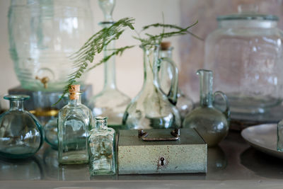 Close-up of containers on table at home