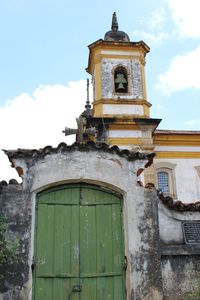 Low angle view of old building against sky