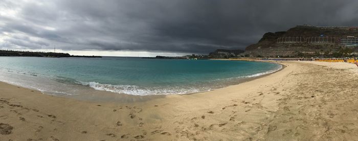 Scenic view of beach against sky