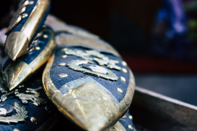 Close-up of metal on table