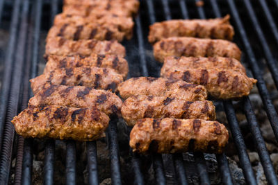 Close-up of meat on barbecue grill