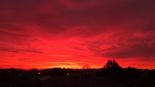 Scenic view of dramatic sky during sunset