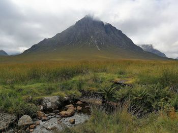 Scenic view of land against sky